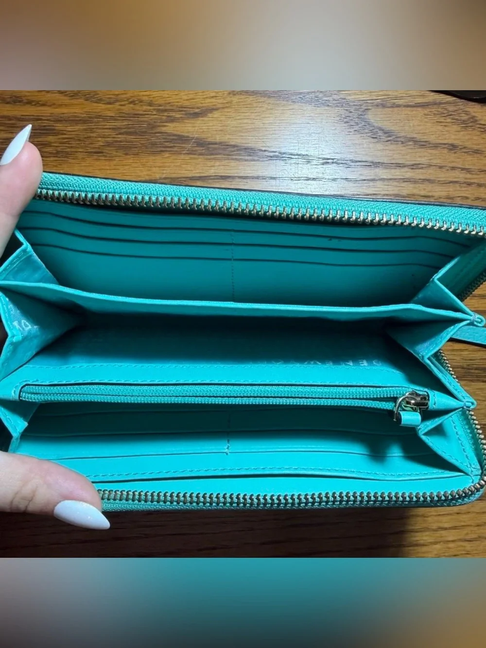 kate spade Turquoise Zip-Around Pebbled Leather Wallet
